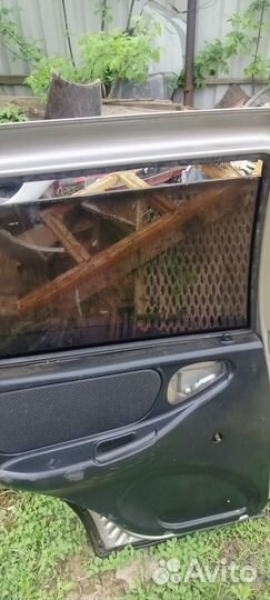 Дверь задняя левая Шеви Нива