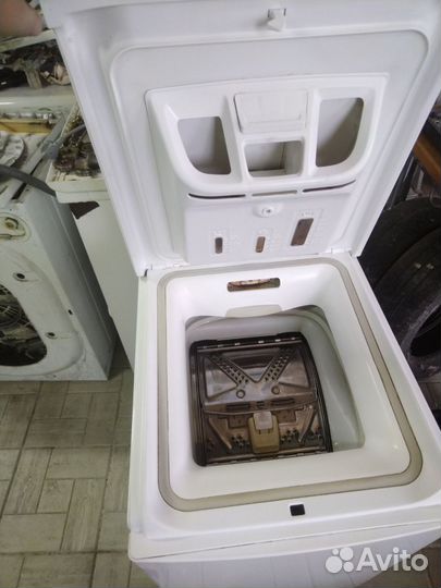 Стиральная машинка с вертикальной загрузкой