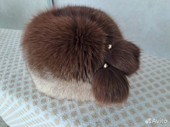 Женские меховые шапки