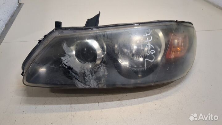 Фара (передняя) левая Nissan Almera N16