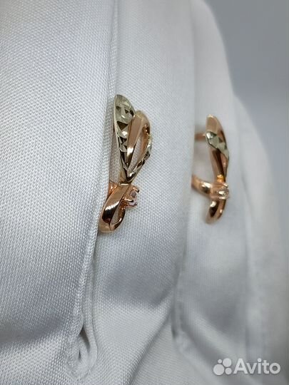 Золотые серьги с камнем