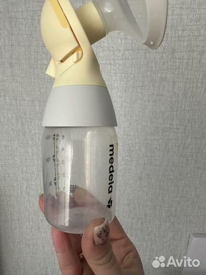 Молокоотсос medela электрический