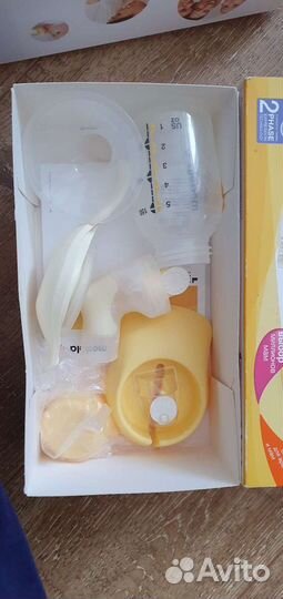 Молокоотсос medela ручной