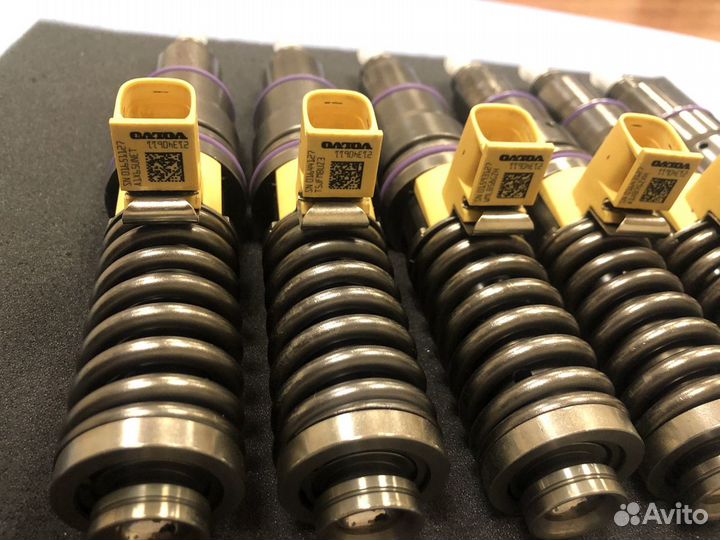 Насос форсунки Volvo D13 21340611