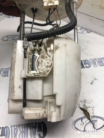 Топливный насос в сборе Mitsubishi Lancer 10