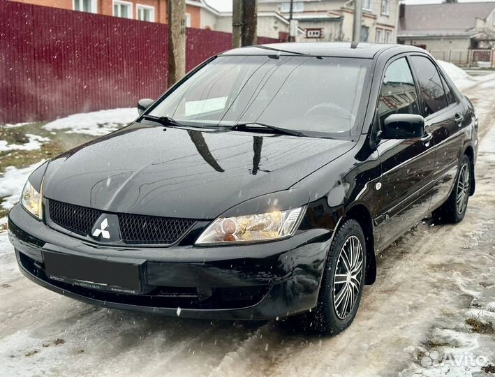 Mitsubishi Lancer 1.6 МТ, 2010, 194 000 км