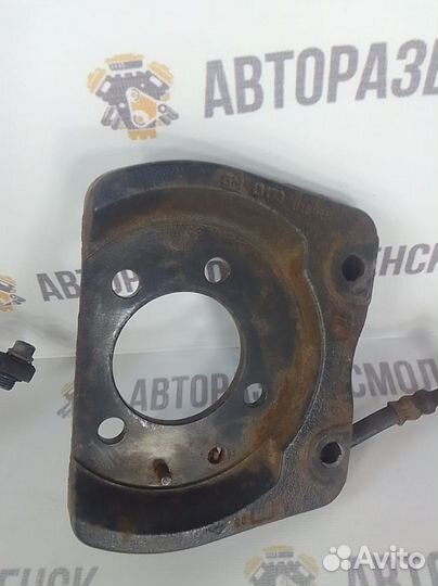 Щит опорный задний Opel Astra H