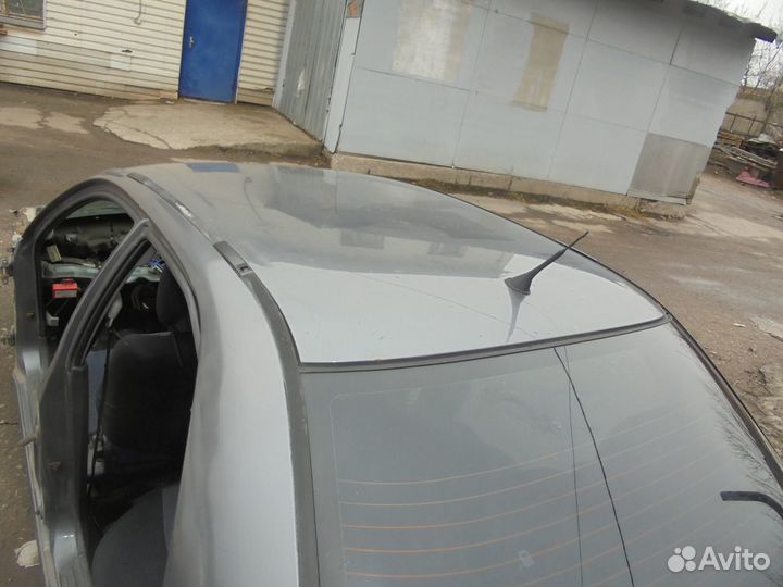 Стекло заднее для Mitsubishi Carisma 99-03