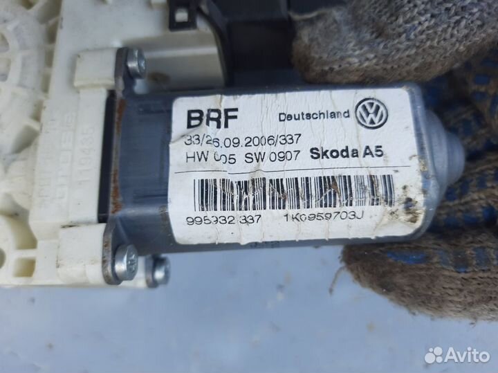 Моторчик стеклоподъемника заднего Шкода Октавия А5