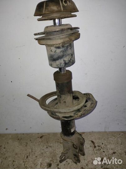 Амортизатор передний левый Tagaz C100 2009-2012