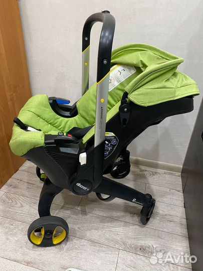 Коляска - автокресло doona с базой isofix