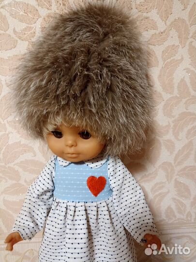 Женские меховые шапки