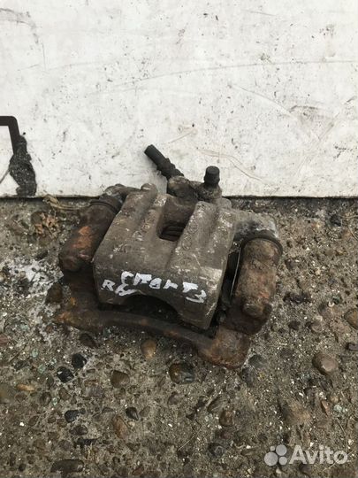 Суппорт тормозной задний правый Kia Sportage