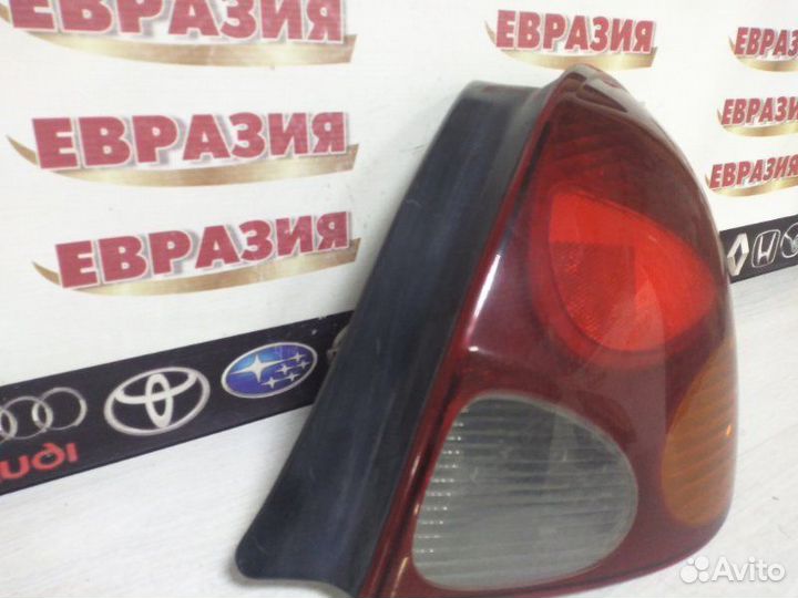 Фонарь задний задний правый Toyota Corolla EE111