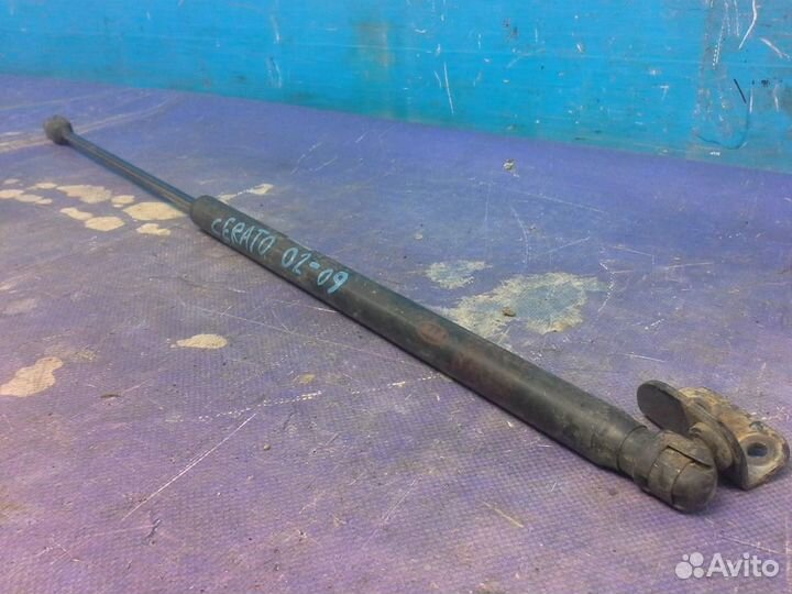 Амортизатор двери багажника Kia Cerato 2004-2008