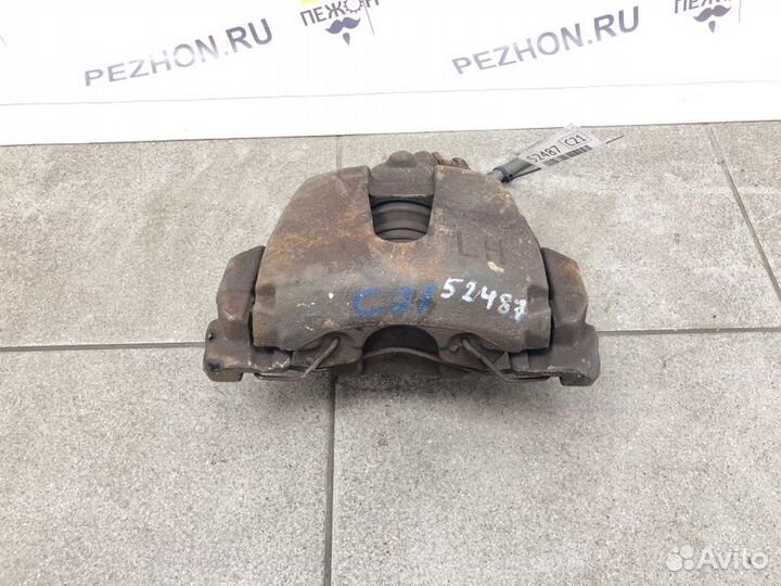 Суппорт тормозной передний левый Ford Focus