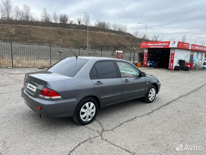 Mitsubishi Lancer 1.6 МТ, 2006, 180 000 км