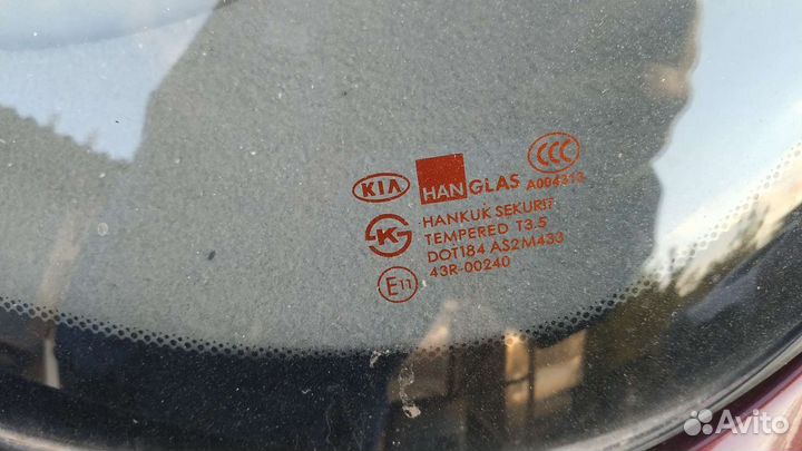 Стекло заднее Киа Спектра