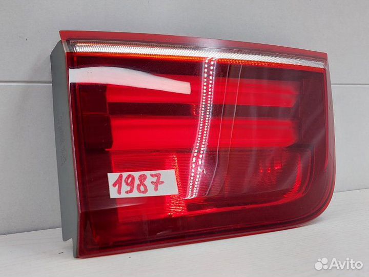 Фонарь заднего хода левый Bmw