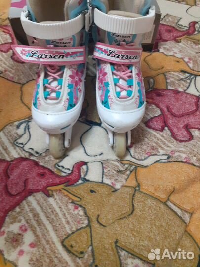 Коньки роликовые