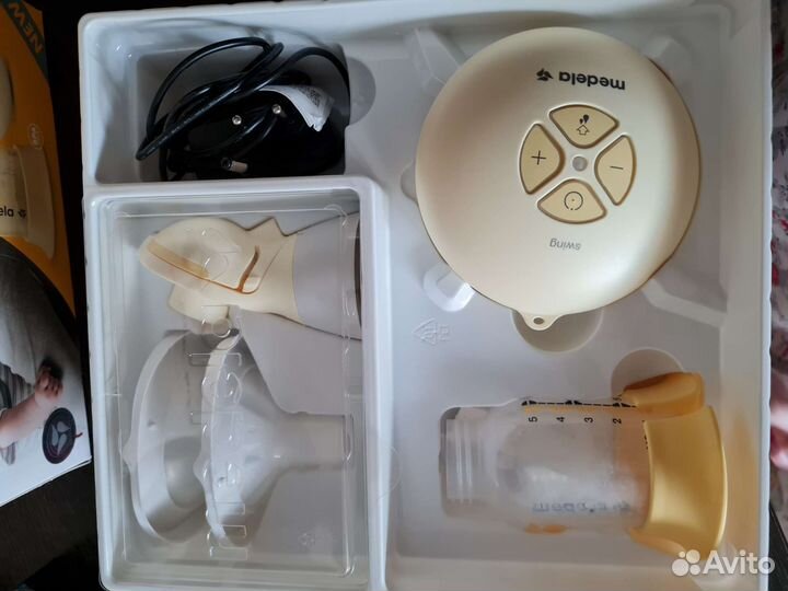 Молокоотсос medela swing электрический