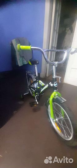 Детский велосипед со съемными колесами