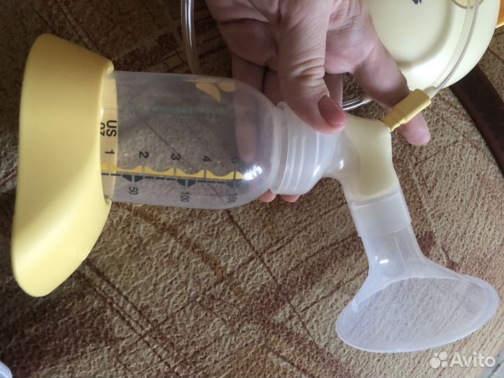 Молокоотсос medela swing электрический