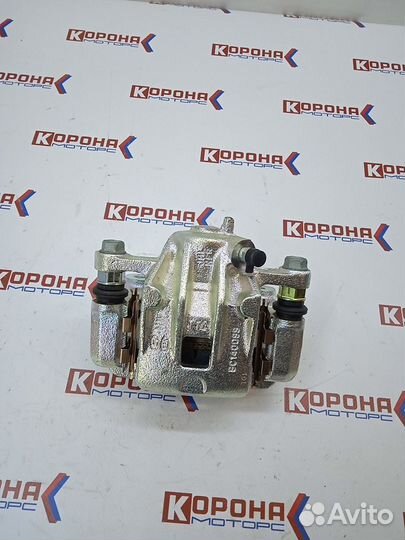 Суппорт задний левый KIA sportage