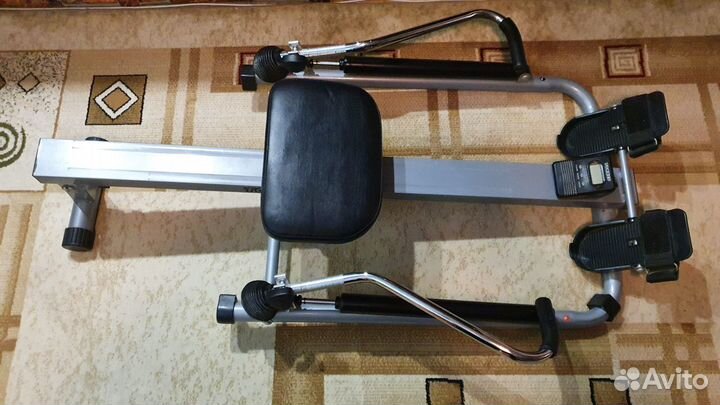 Гребной тренажер