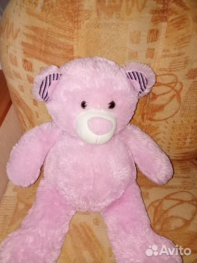 Розовый плюшевый мишка