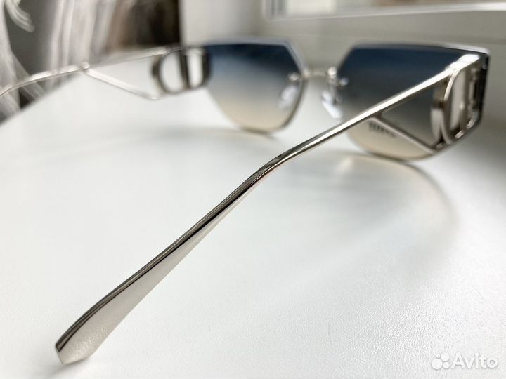 Очки Dior металлические солнцезащитные женские