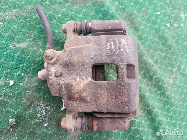 Суппорт передний левый на Ниссан Альмера N15 1999г