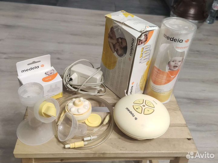 Молокоотсос medela электрический