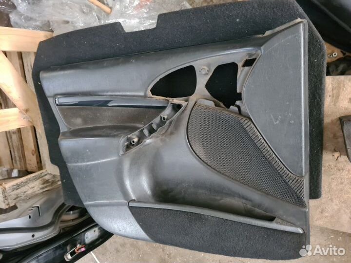 Обшивка двери передняя левая Ford Focus 1