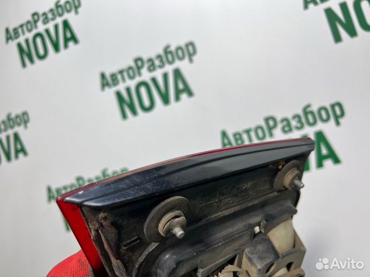 Фонарь заднего хода задний левый Nissan Almera N16