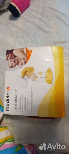 Молокоотсос medela электрический
