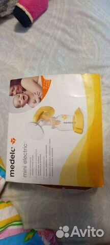 Молокоотсос medela электрический