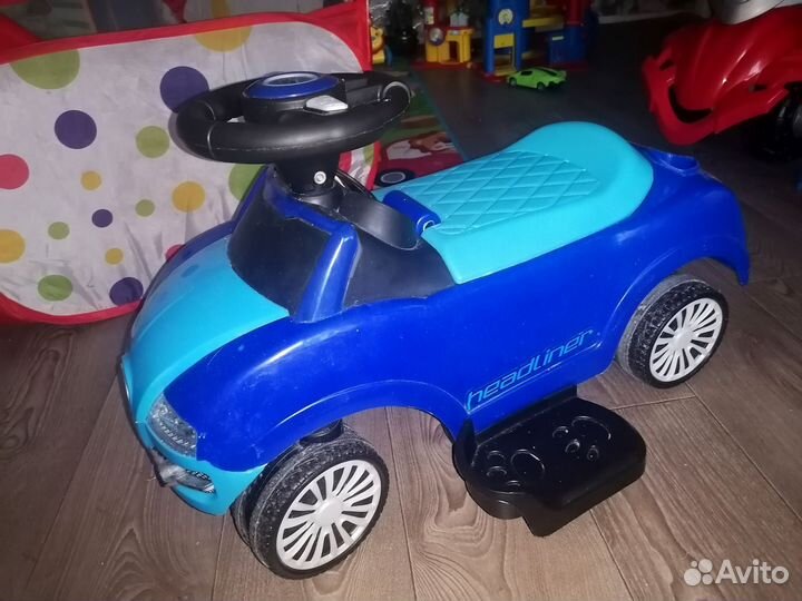 Машинка каталка с ручкой