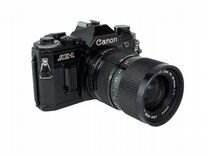 Canon AE-1 с объективом Canon zoom lens FD 35-70mm
