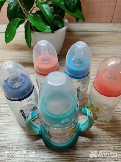 Поильники и бутылочки с соской для грудничков