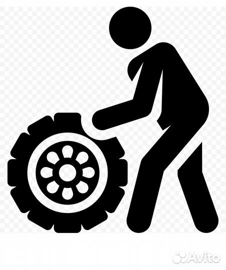 Сотрудник шиномонтажа