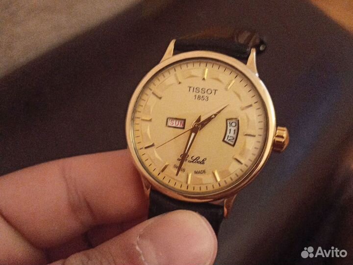 Золотые часы Tissot