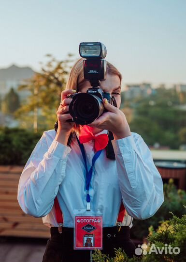 Фотограф