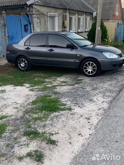 Mitsubishi Lancer 1.3 МТ, 2006, 240 000 км