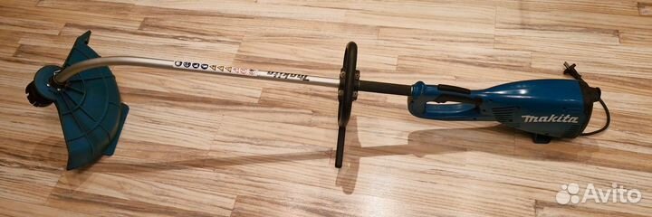 Электрокоса Makita UM4030