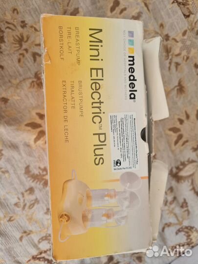 Молокоотсос medela электрический