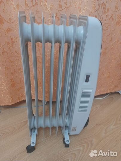 Масляный обогреватель