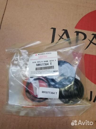 Ремкомплект суппорта Mitsubishi L200 MR977364