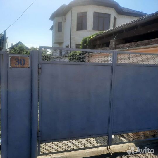 Секционные ворота с калиткой бу