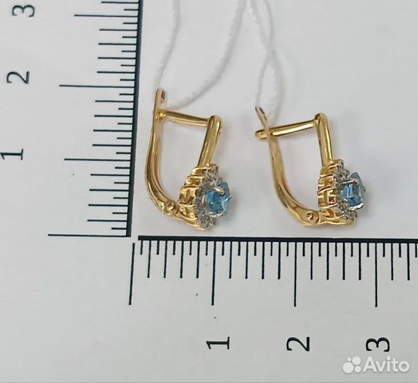 Золотые серьги с камнем